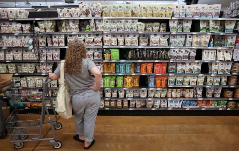 Couple worried about U.S. consumer sentiment drop and recession fears in 2025