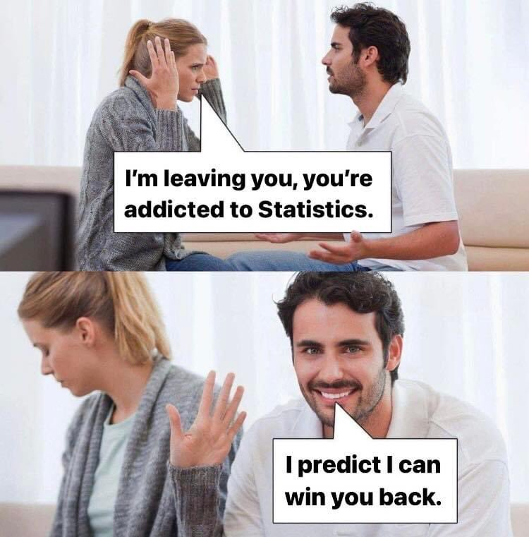 Two-panel comic image featuring a couple on a couch. In the first panel, a woman with a ponytail, wearing a gray cardigan, gestures with her hand to her head and says, "I'm leaving you, you're addicted to Statistics." A man with dark hair, wearing a white shirt, looks at her with a neutral expression. In the second panel, the woman turns away with her hand raised, while the man smiles confidently and says, "I predict I can win you back." The background is a light-colored room with curtains and a TV.