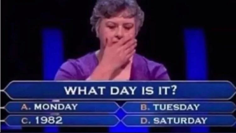 Confused quiz show contestant meme with multiple-choice question "What day is it?" featuring answers Monday, Tuesday, 1982, and Saturday — a funny Tuesday meme about losing track of time.