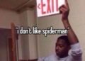 Man holding an exit sign meme reacting to someone saying they do not like Spider-Man