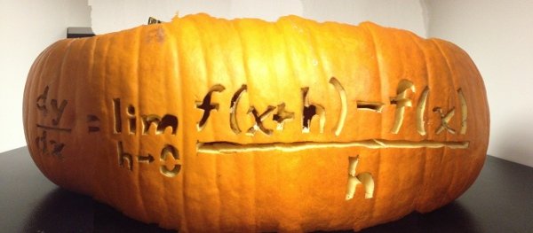Halloween pumpkin carved with the limit definition of the derivative math meme