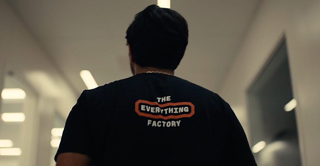 Foundry Robotics team member wearing The Everything Factory T-shirt as Foundry Robotics raises $100M Series A