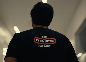 Foundry Robotics team member wearing The Everything Factory T-shirt as Foundry Robotics raises $100M Series A